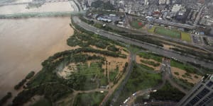 Record-setting rainfall swamps South Korea’s capital,killing several