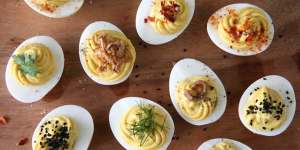 Devilled eggs are making a comeback:Spruce them up with your choice of toppings such as crisp-fried shallots,anchovy fillets or crushed pappadums.
