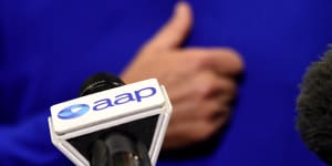The AAP logo on a microphone 