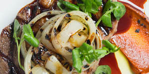 Wagyu bavette serves with charred onion,watercress and harissa at Saint Urban.