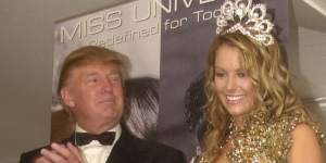 Former Miss Universe owner Donald Trump with pageant winner Jennifer Hawkins in 2004.