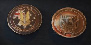 Souvenir Australian SAS coins given to military allies in Afghanistan.