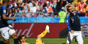 Unlikely career move:Josh Risdon fouls Antoine Griezmann.