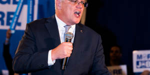 The great campaigner:Prime Minister Scott Morrison addresses a Liberal Party rally on Sunday. 