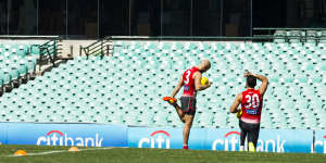 Adam Goodes and Jarrad McVeigh at training back in 2014.