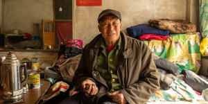 Liu lives in a crumbling village. Nearby a compound of luxury villas remain untouched