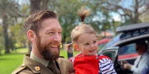 Dusty Miller and his daughter,Eliza. Dusty has had trouble shaking the memory of events in Afghanistan.