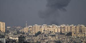 Smoke rises following an Israeli airstrike in the Gaza Strip,as seen from southern Israel.