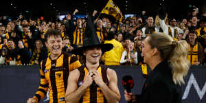 Nick Watson (aka “the Wizard”) commandeers a wizard hat from the crowd. 