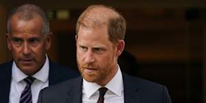 Prince Harry leaves Chatham House in London on Tuesday.