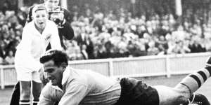 Australian rugby union footballer Jim Lenehan dives to score against South Africa at the SCG on June 19,1965.