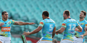 Jamal Fogarty celebrates a try against the Roosters.