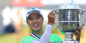 Minjee Lee poses with the trophy after winning the US Women’s Open at Pine Needles in June.