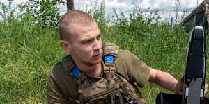 A Ukrainian soldier prepares to launch an interceptor drone in Kharkiv,eastern Ukraine.
