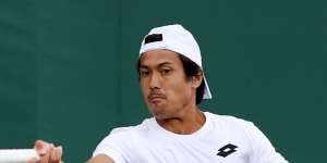 Jason Kubler plays a forehand against Dennis Novak of Austria.