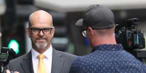 Simon Overland arriving at the royal commission last year.