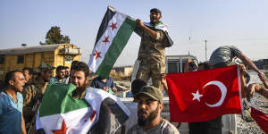 Turkish-backed Syrian National Army fighters in Akcakale on October 13.