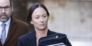 ACT Police Senior Constable Emma Frizzell arrives at the ACT Civil and Administrative Tribunal on Thursday.