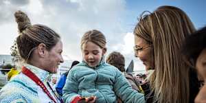 Emily Petricola shares her new jewellery with Kerry Young and her daughter Riley.