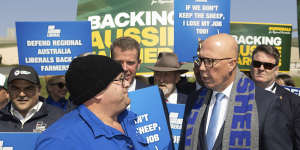 Ben Sutherland from Keep the Sheep and Opposition Leader Peter Dutton during the farmers’ rally at the front of Parliament House in Canberra. 