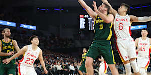 Australia’s Mitch McCarron drives to the basket against China in 2022.