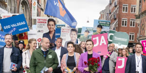 The five leaders of the political parties belonging to the ‘National Compromise’ campaign for a YES,including Prime Minister Mette Frederiksen (in purple),in the centre of Copenhagen on Wednesday.