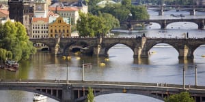 Charles Bridge on Vltava River in Prague.