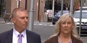 James Hayward and his wife enter Perth District Court.