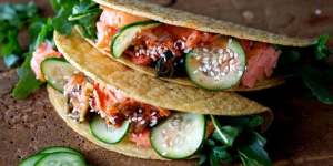 Cuisine mash-up in a hot,crunchy shell:Salmon and kimchi tacos.