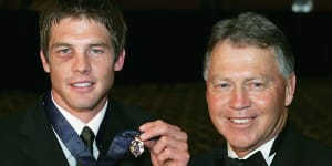 Ben Cousins poses with his father Bryan after winning the 2005 Brownlow Medal. 