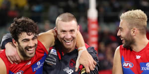 Christian Petracca,Simon Goodwin and Christian Salem are in high spirits after Melbourne’s impressive win over Port Adelaide.