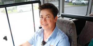 “I really love it”:Pauline Menczer at the wheel of the school bus she drives for a living. 