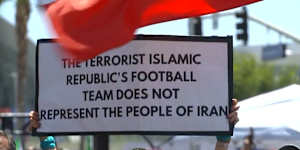 Demonstrators have gathered outside the Los Angeles stadium staging Iran's World Cup opener.