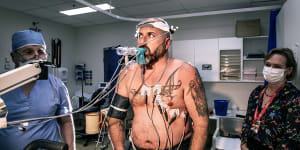 Ken Parker,47,has his lung capacity measured after contracting silicosis.