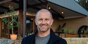 Grand Designs Australia host outside the ‘earthship’ house in Tasmania featured in episode one. 