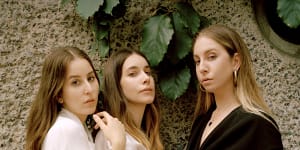 Why Haim's new tracks'feel like a graduation,complete with celebration and fear'