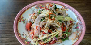 Summer on a plate:Shredded coconut-poached chicken with green mango and prawns.