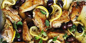 Braised chicken with lemon,oregano and olives.