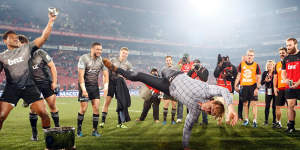 Who's the boss:First-year coach Scott Robertson celebrates the title with his now trademark breakdance routine.