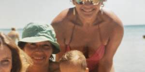 Liliana (left) and Lydia with Liliana’s grandson Nick at Mt Martha beach in the 1980s.