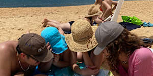 Crosswords on the beach.