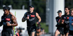 Brayden Maynard (centre) at Collingwood’s open training session on Friday.