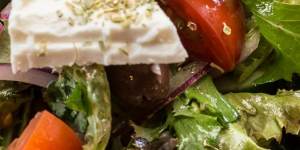 Meat-free moussaka and Greek salad with vegan feta.