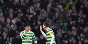 Celtic recruit Reo Hatate celebrates his second goal with skipper Callum McGregor.