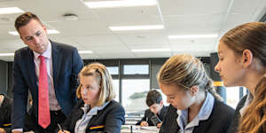 Maths teacher Simon Jenkins with year 8 students at Marist College North Shore.