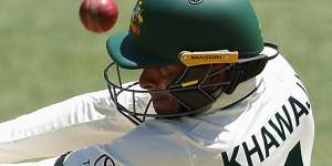 Usman Khawaja bats during day four of the Men’s First Test match between Australia and Pakistan on December 17. He has been charged by the ICC.