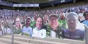 Cardboard fans,masked players for German soccer's return
