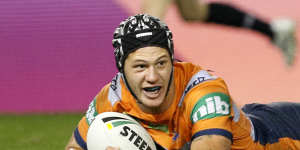 Shining Knight:Kalyn Ponga crosses for another try for Newcastle.