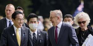 Japan’s Prime Minister Fumio Kishida,front left,walks with Australian Prime Minister Anthony Albanese in November. 