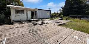 The house at 22 Ashvale Street,Kingston,was marketed as a half-finished three-bedroom opportunity with all the kitchen materials included and ready for installation.